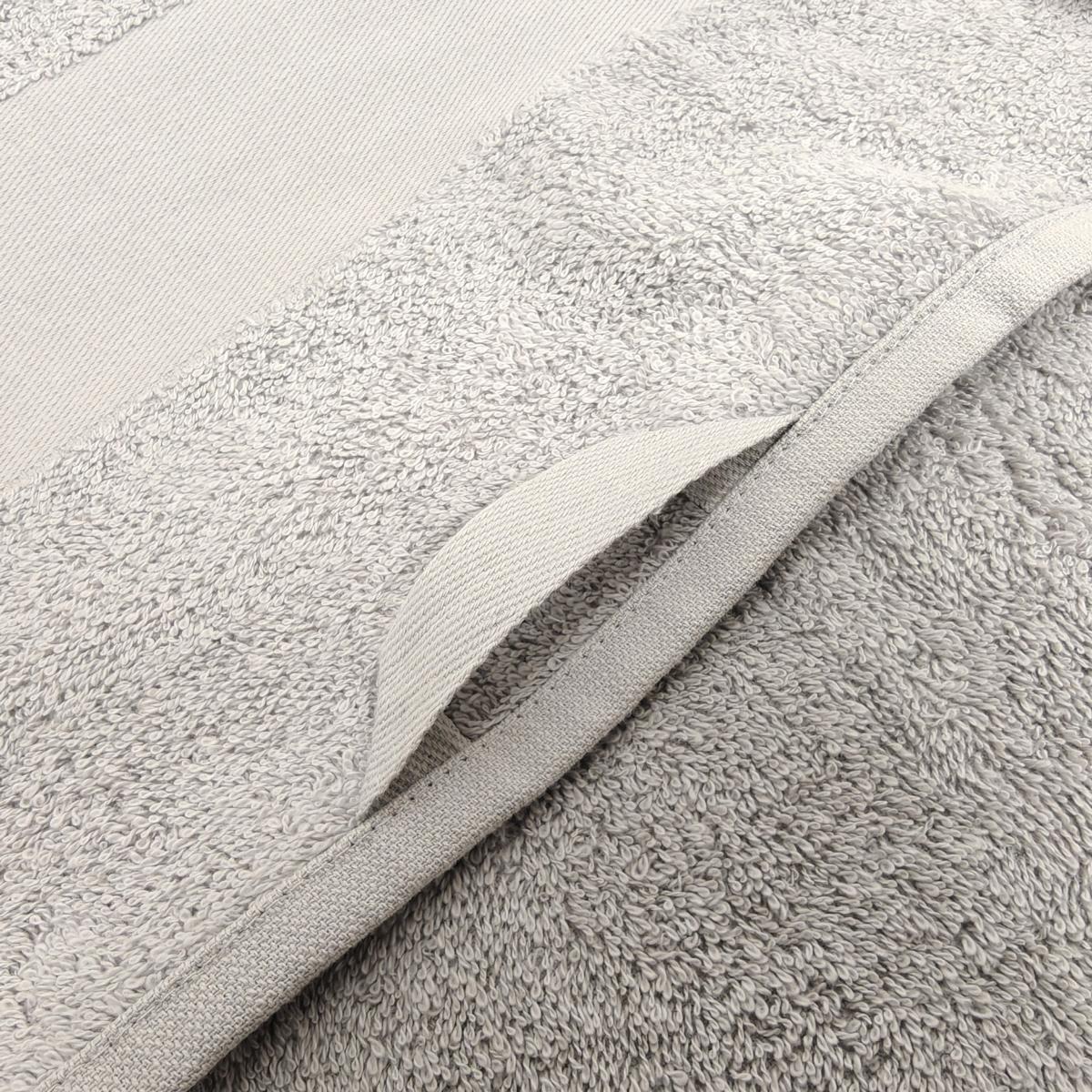 Eine Nahaufnahme des Aufhängehakens des Tuches.