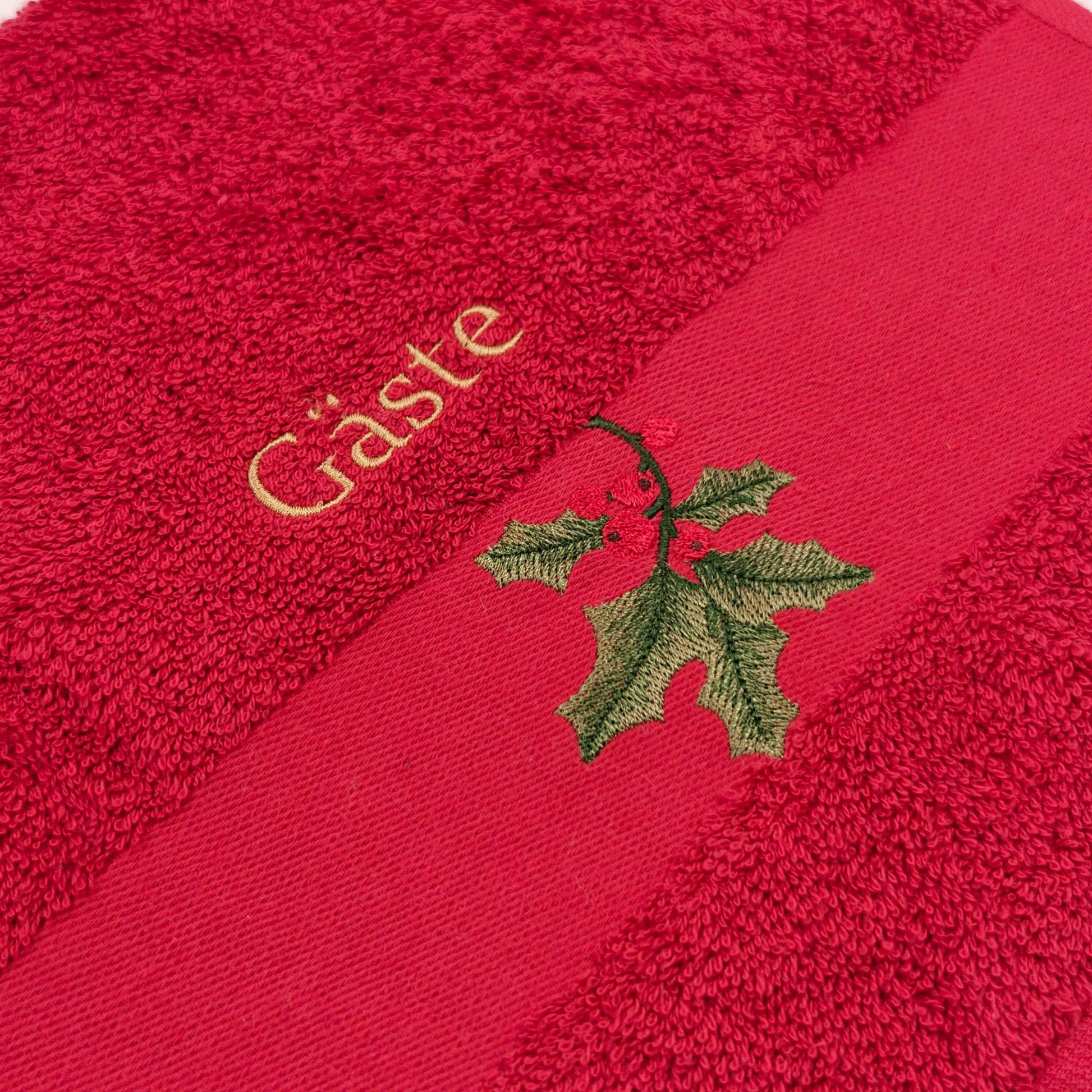 Nahaufnahme der Stechpalmenstickerei um die Qualität zu zeigen